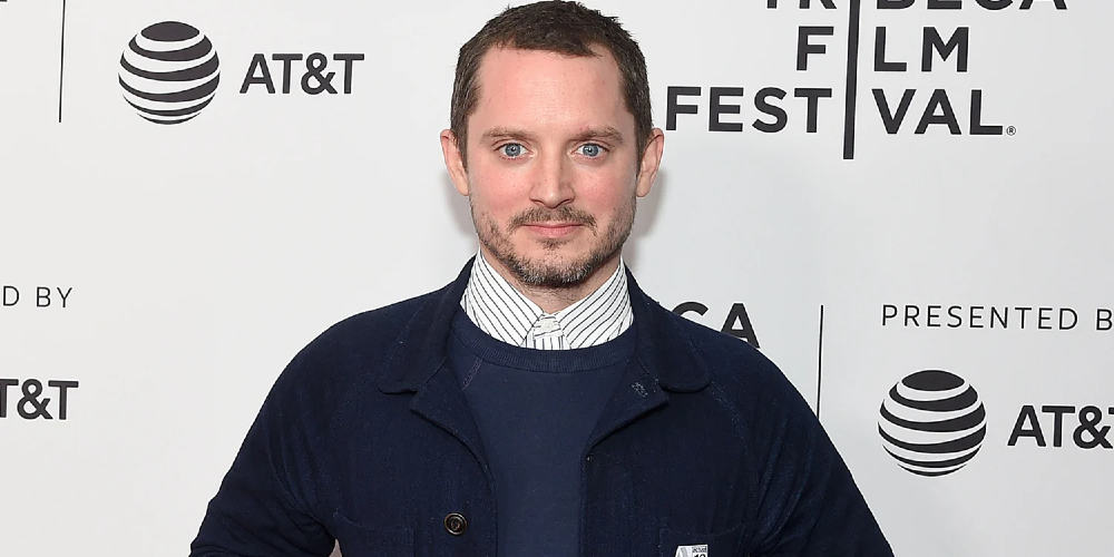 Elijah Wood's New Look in Bookworm Sparks Imaginative Fan Theories for Lord of the Rings Connection